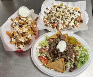 own a thriving Greek eatery