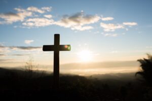 silhouette of catholic cross and sunrise 2023 11 27 05 24 14 utc
