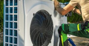 hvac worker installing electric heat pump 2022 12 16 11 50 13 utc1 1