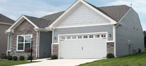 house with garage and shake siding left photo