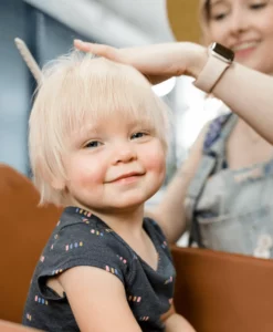 Monkey Dooz hairstylist giving a haircut to an adorable blond 2023 11 27 04 54 06 utc 1 1 min